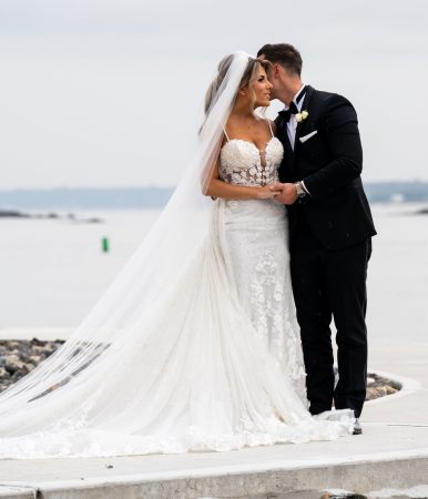 just married waterfront pose