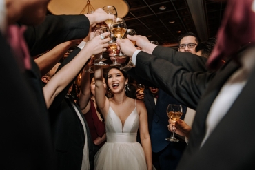 bride cheering with champagne
