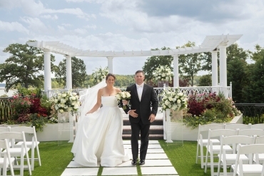 Bride & Groom walking down isle