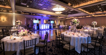 west ballroom with purple neon lighting dj booth