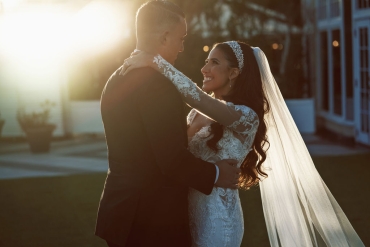 bride staring into eyes of groom