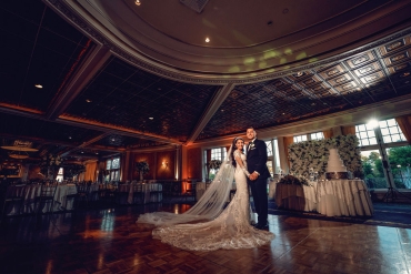 couple posing on dance floor by themselves