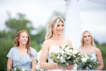bride with bridesmaids in background