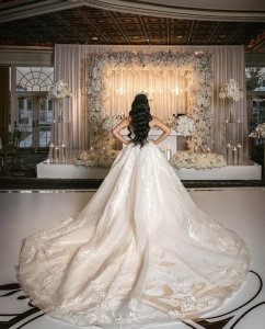 brides dress spread on floor