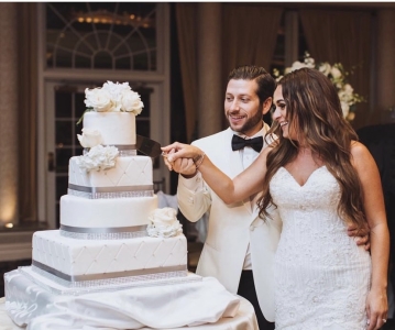 bride cutting cake