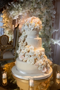 wedding cake draped with editable flowers