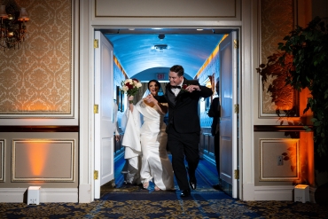 newlyweds walking out door