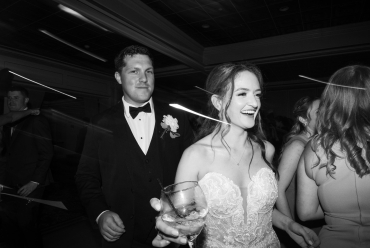 bride and groom getting drinks