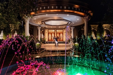 colorful lighting at vip's water fountain in front of entrance