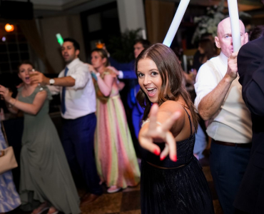 dancing with hands in air at vip 600 club lounge